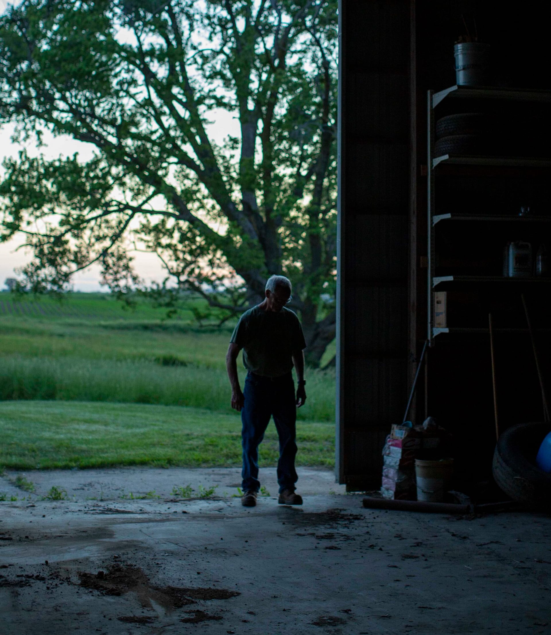 Farmer walking in a building